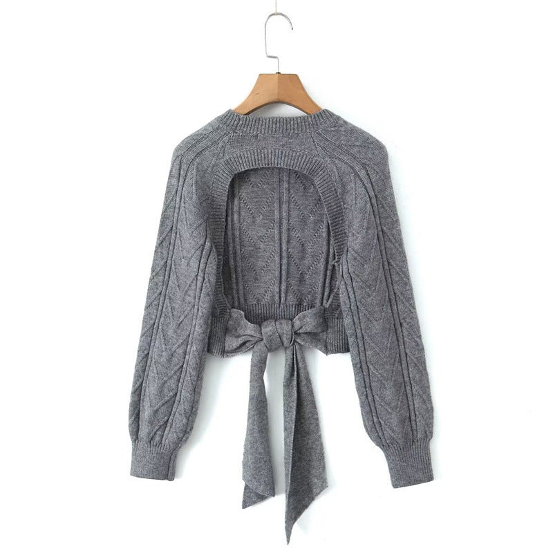 Elise - Stickad cropped tröja med knytdetalj