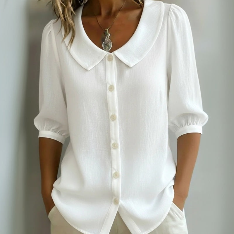 Céline™ | Avslappnad blus i enfärgad design med rundad hals
